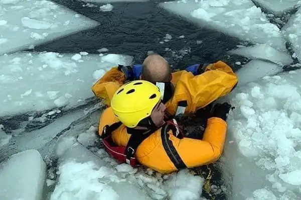 Ice rescue training on a frozen lake with Fernie Fire Rescue